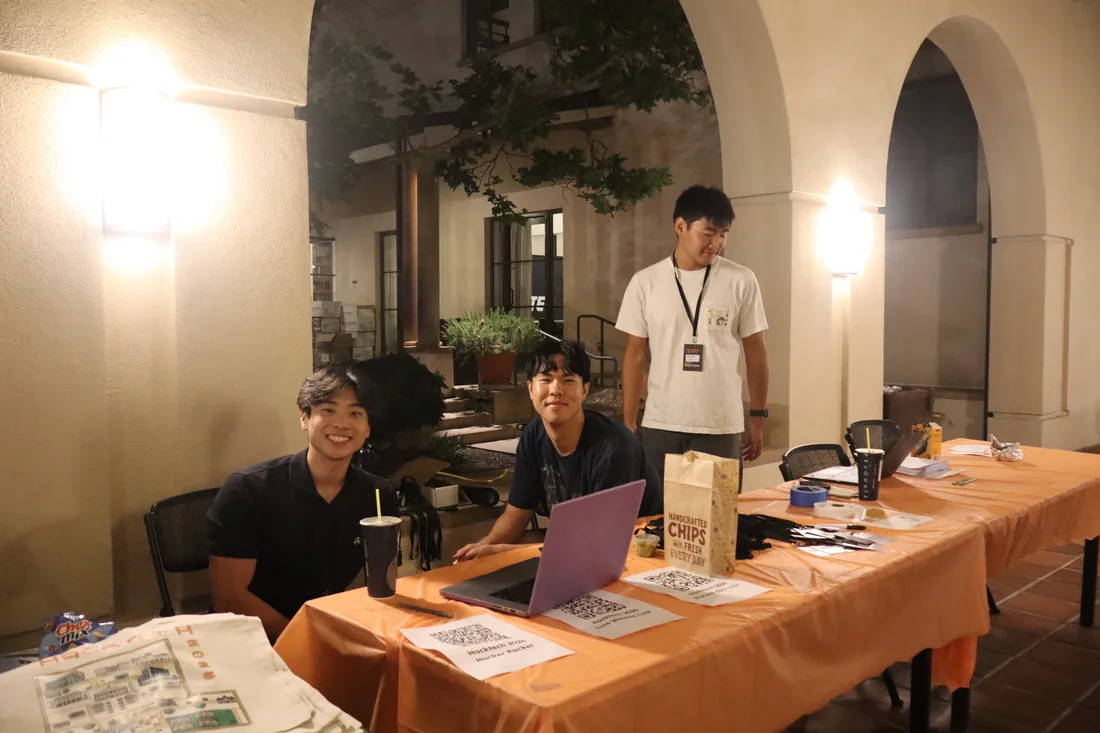 Hacktech organizers at the evening check-in table